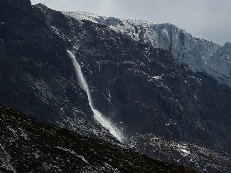 Glacial waterfall from hanging glacier