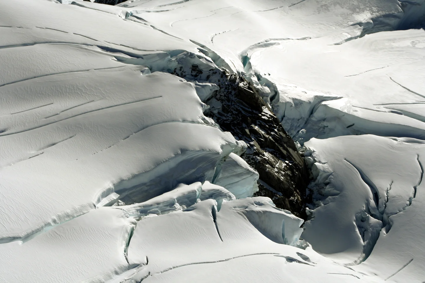Rock knob surrounded by glacier ice