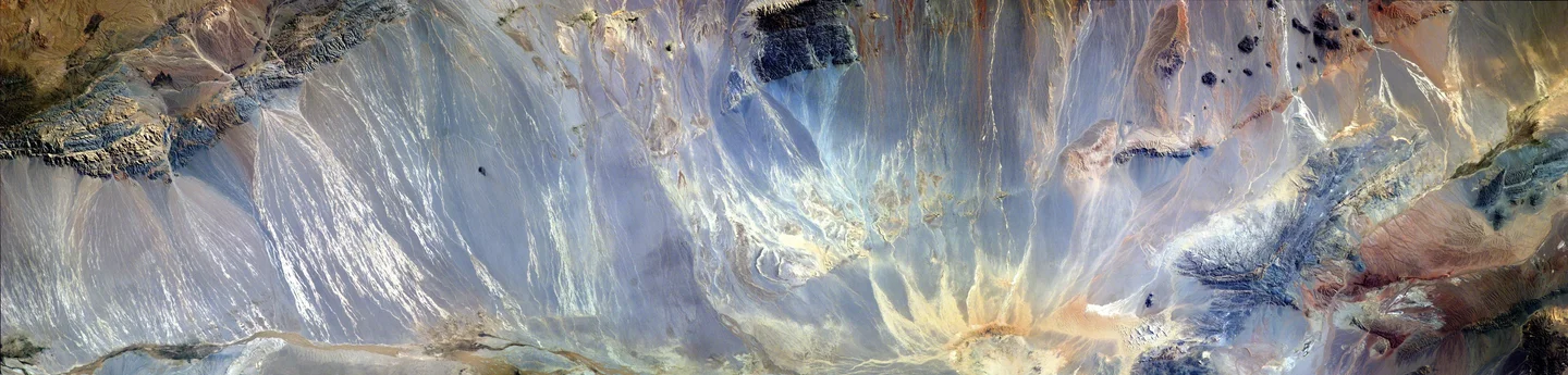 Mountains, ice and sand frozen in time