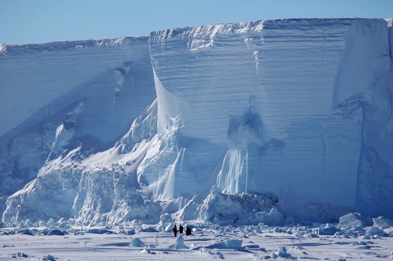 Dwarfed by a grounded iceberg