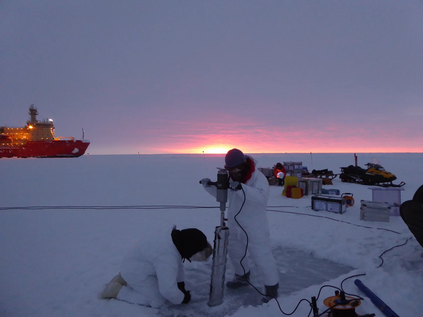 Sea ice drilling and the pink sun of the antarctic winter!