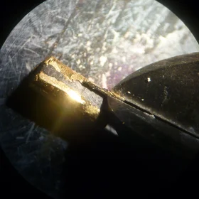 Artificial peridotite takes its gold coat off