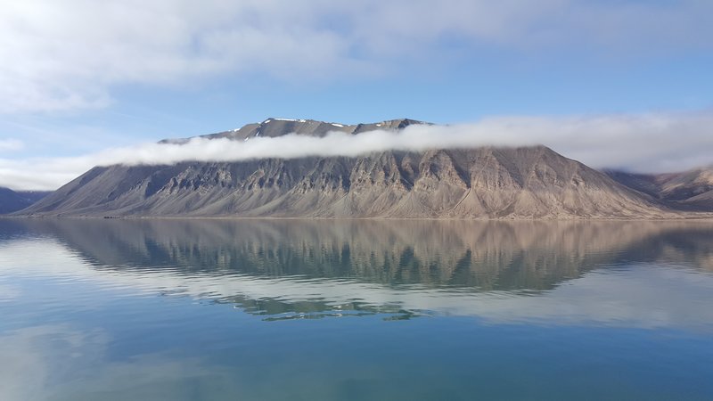 Amazing reflection of Spitsbergen Wijdefjorden in the Svalbard, the Arctic