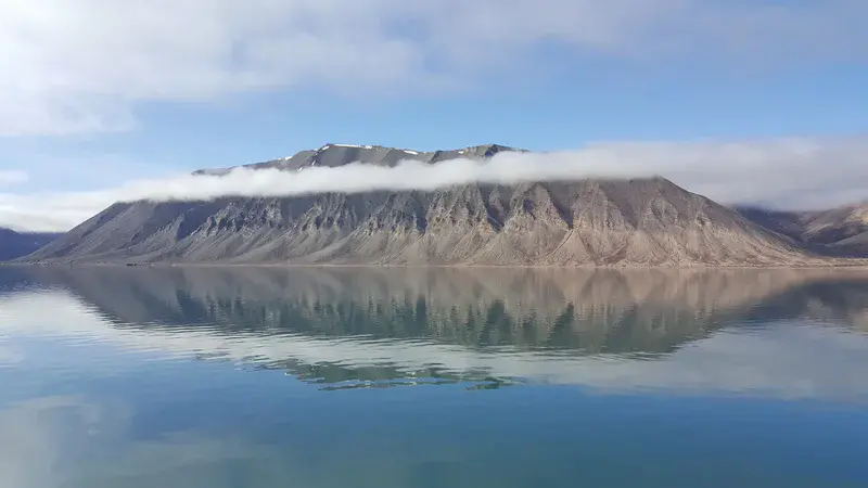 Amazing reflection of Spitsbergen Wijdefjorden in the Svalbard, the Arctic