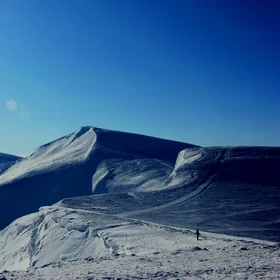 Snow world above the forest line