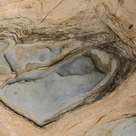 Heart texture in rock formation on the beach