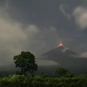Fuego volcano at night from a local football pitch