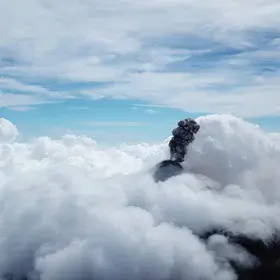 Fuego Eruption Plume Meets Cloud Bed