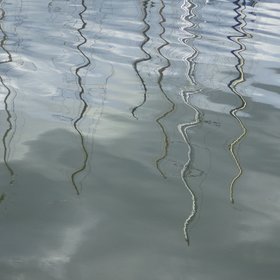 Wavy water and mirrored lines