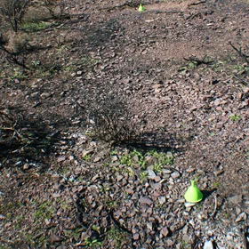 Installing double-funnel devices for measuring splash erosion in burned soil