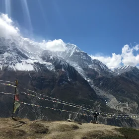 Clouds shining through the eyes of the blue sky