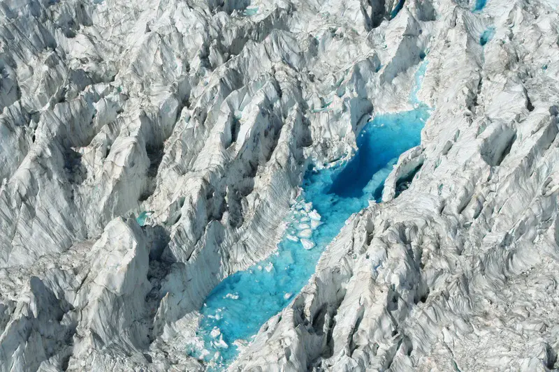 Temporary pond within ice fall of Fox Glacier