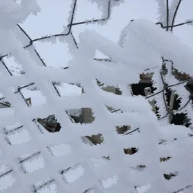 After storm  imprinted on the fence