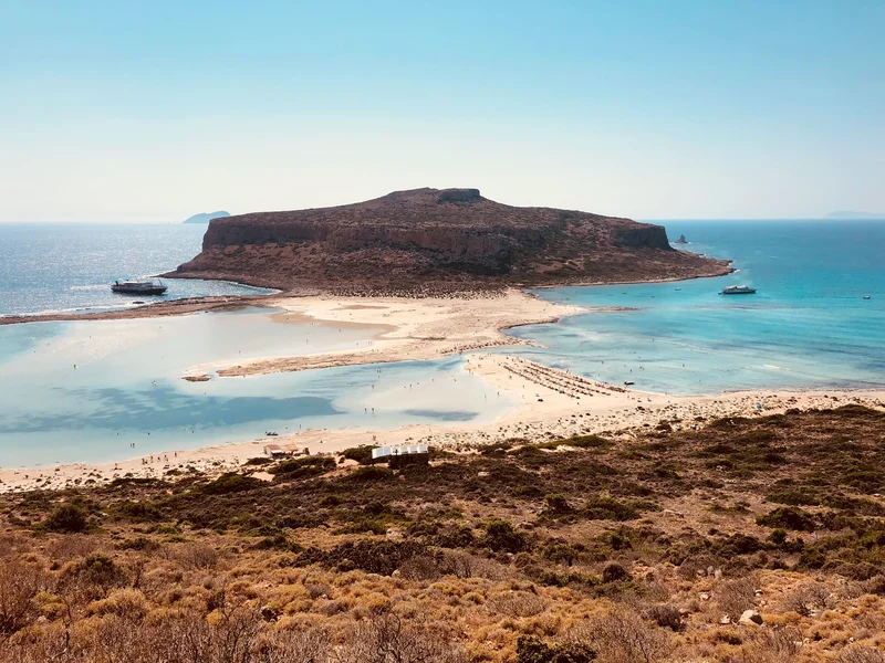 Merge of seas at the Balos Bay