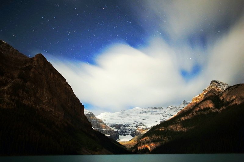 Night sky over the emerald glacier Lake