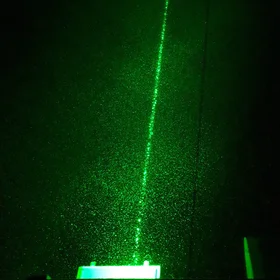 Dancing Snow Flakes in Laser Spot Light