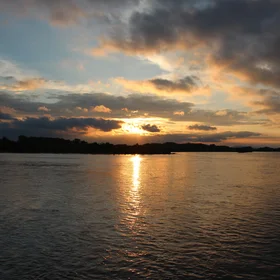 Sunset Over Water Surface stock images