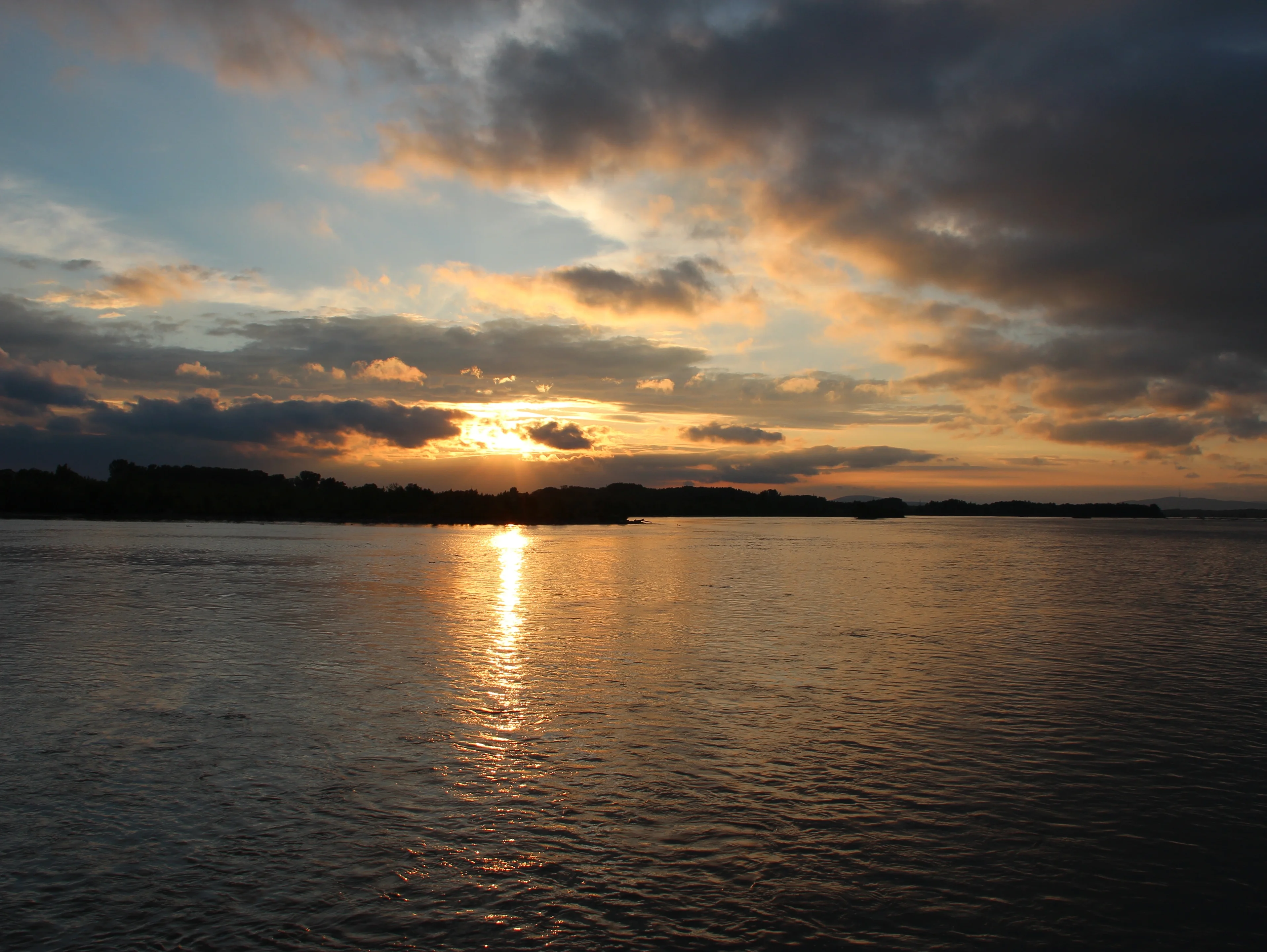 Sunset Over Water Surface stock images