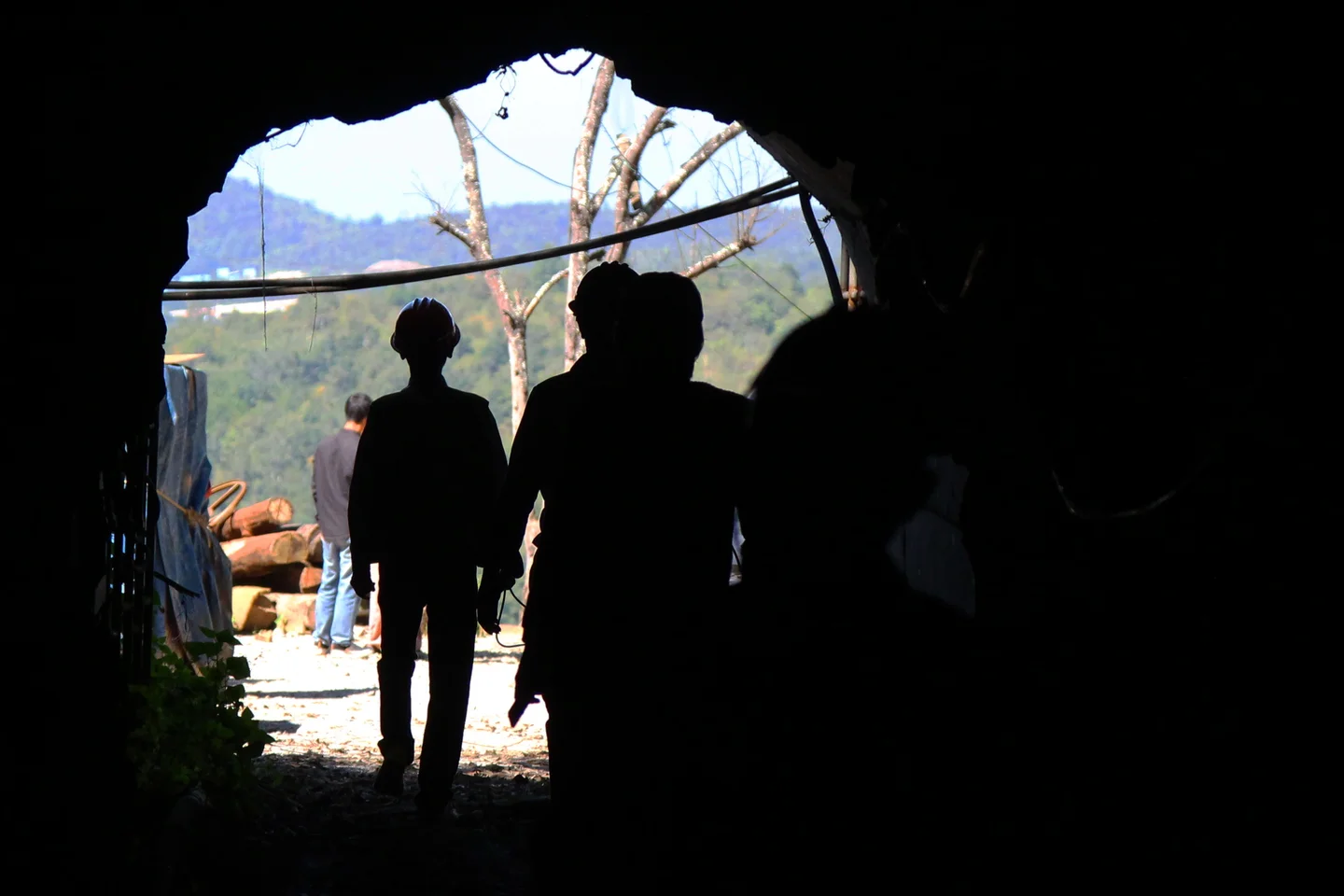 Workers exiting a mine shaft, Bawsaing, Myanmar