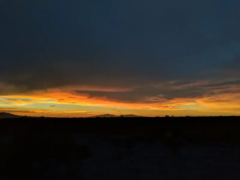 Cloudy desert sunset after monsoon.