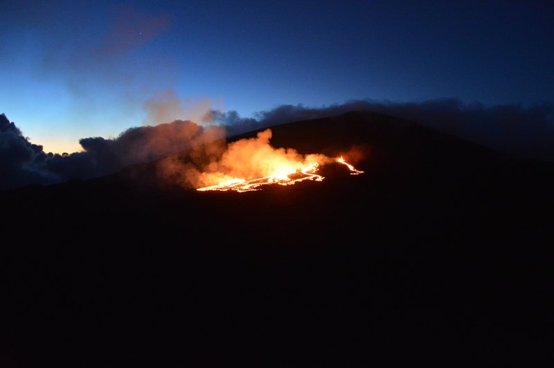 Sunrise on an erupting volcano
