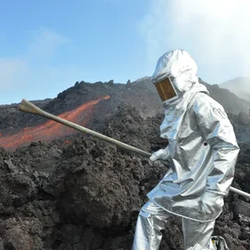 Scientist and lava flows.