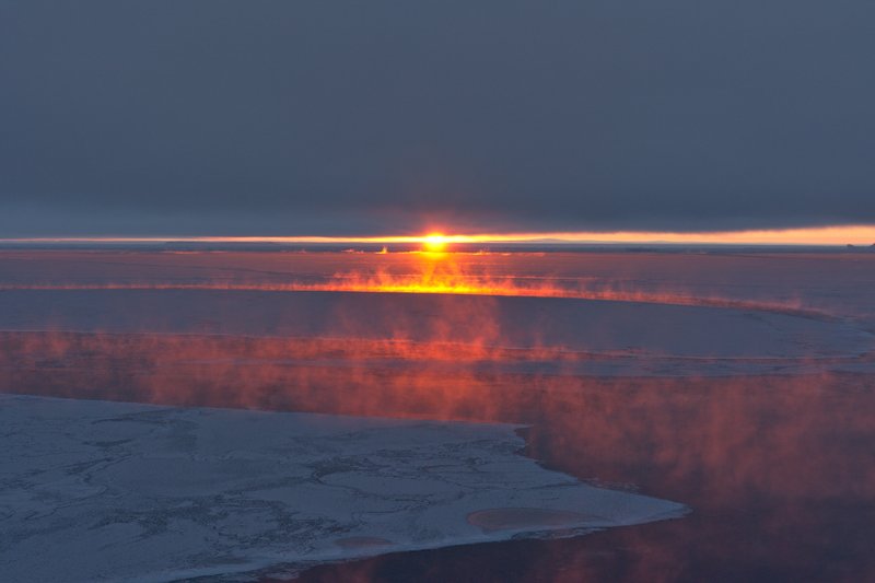 Sunset sea smoke, Antarctica