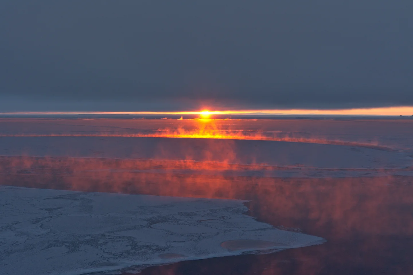 Sunset sea smoke, Antarctica