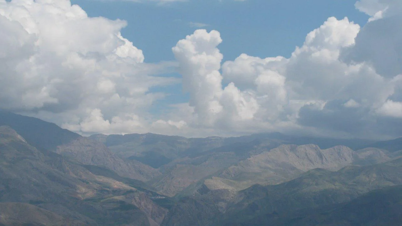 The combination of mountain and cloud in Shah Alborz Mountain Range - Alborz Mountains - Qazvin - Iran