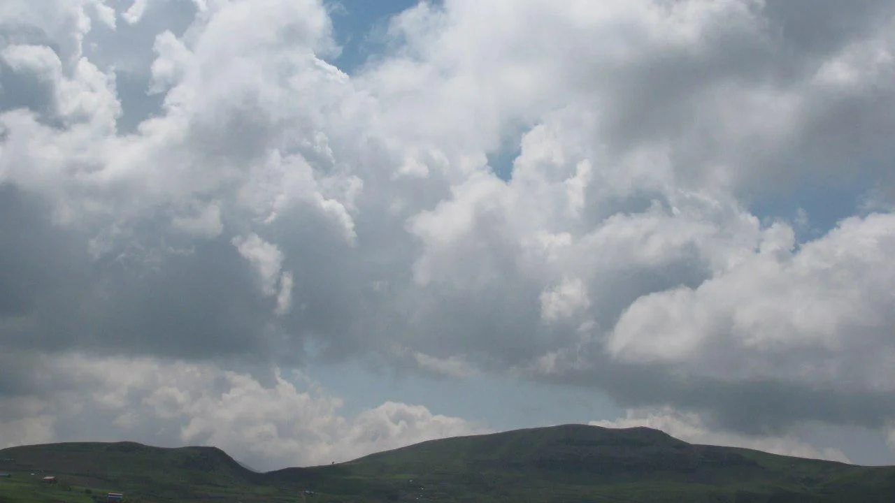 The combination of mountain and cloud in Shah Alborz Mountain Range - Alborz Mountains - Qazvin - Iran