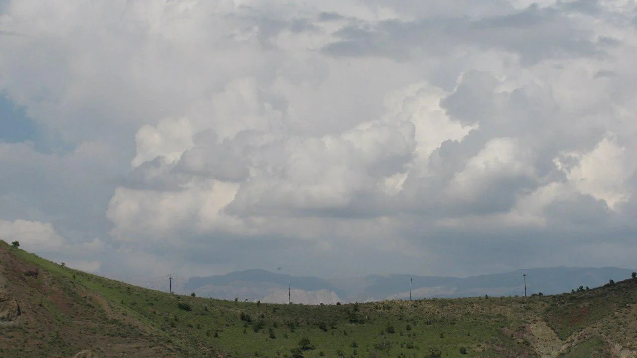 The combination of mountain and cloud in Shah Alborz Mountain Range - Alborz Mountains - Qazvin - Iran