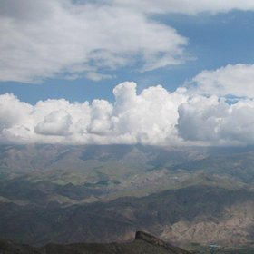 The combination of mountain and cloud in Shah Alborz Mountain Range - Alborz Mountains - Qazvin - Iran