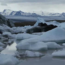 Floating ice in the glacial lake of Fjallsárlón in Iceland