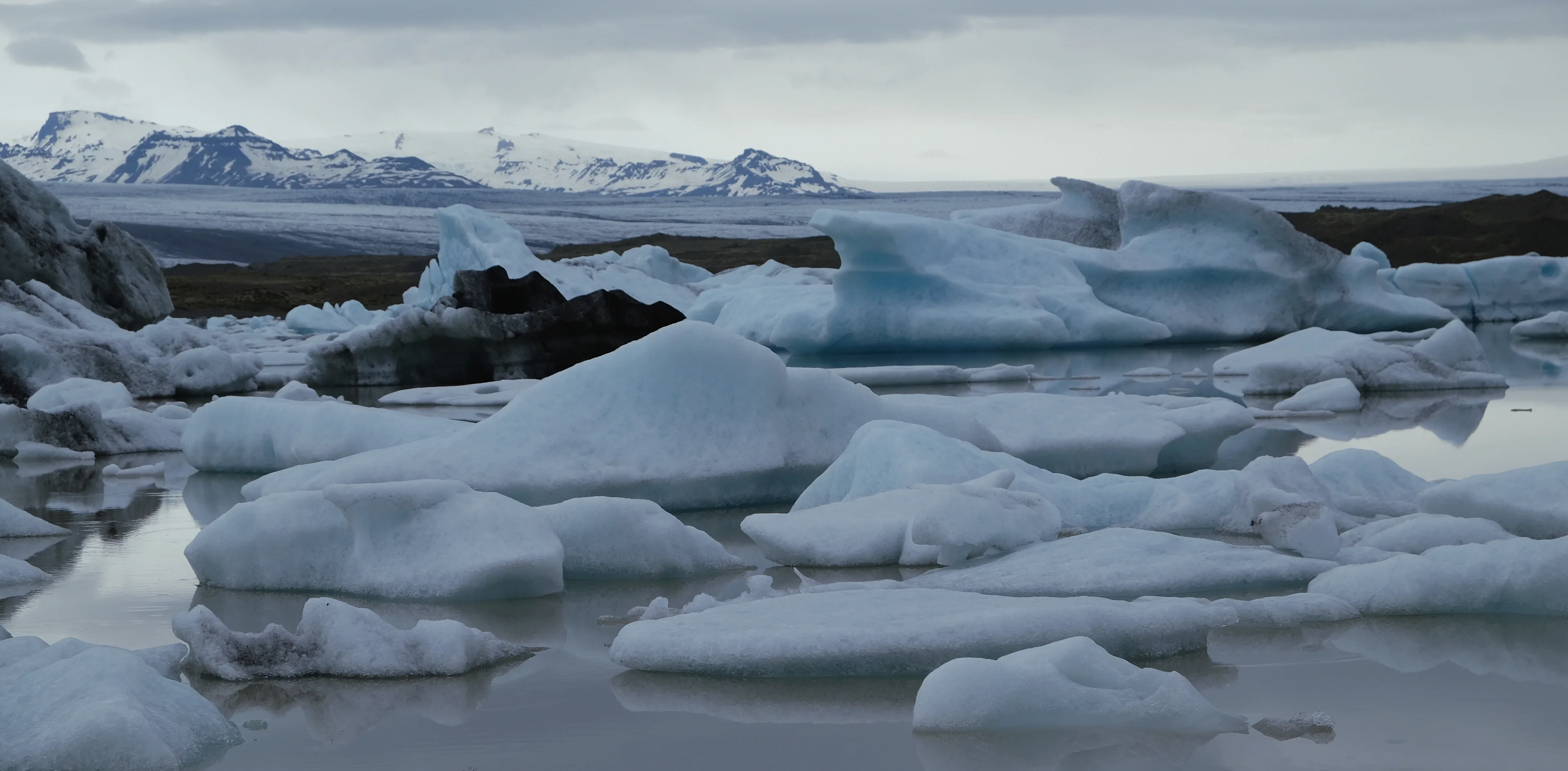Floating ice in the glacial lake of Fjallsárlón in Iceland