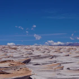 A volcanic change of matter: ashes to waves