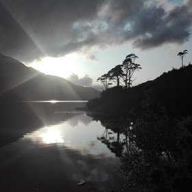 Sun peaking through the clouds at the Killary Fjord