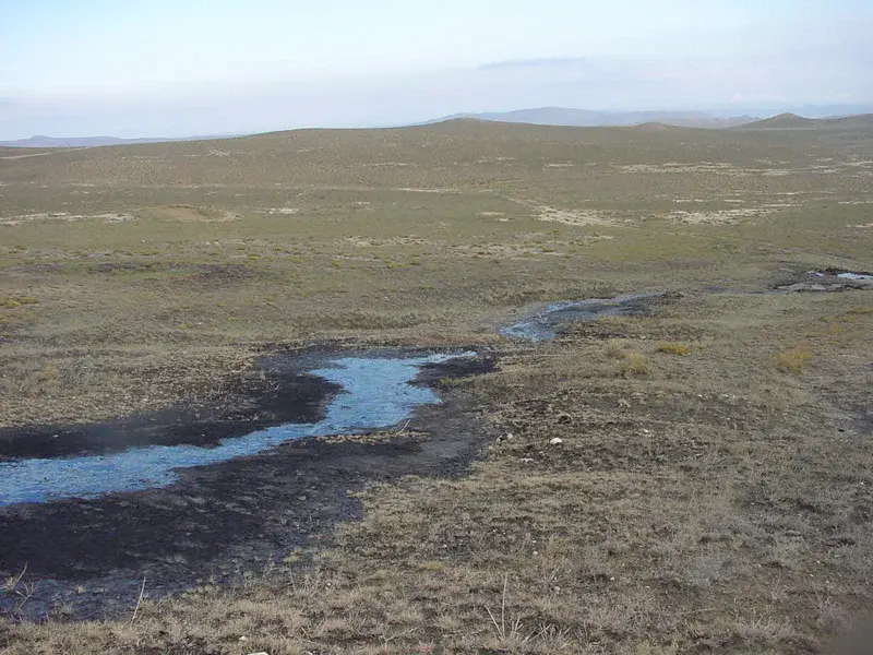 Azerbaijan, Kobustan area, oil river from active mud volcano