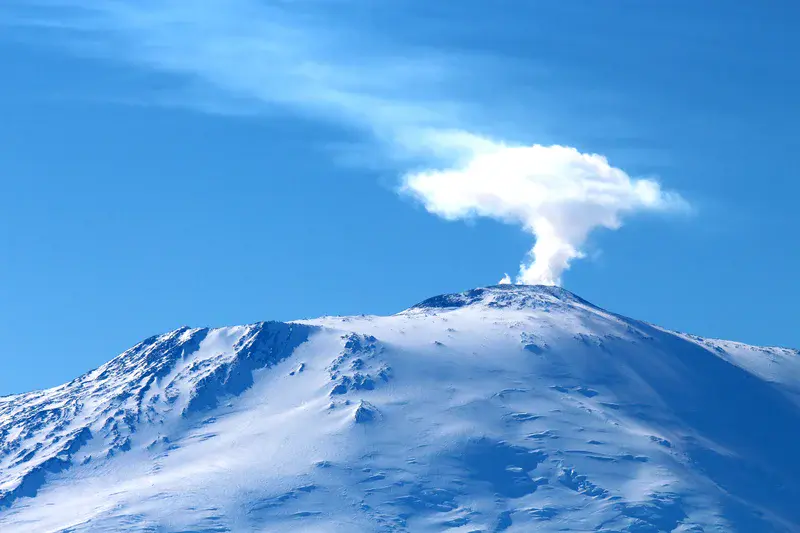 Plume of steam rising from the crater of Mount Erebus, Antarctica