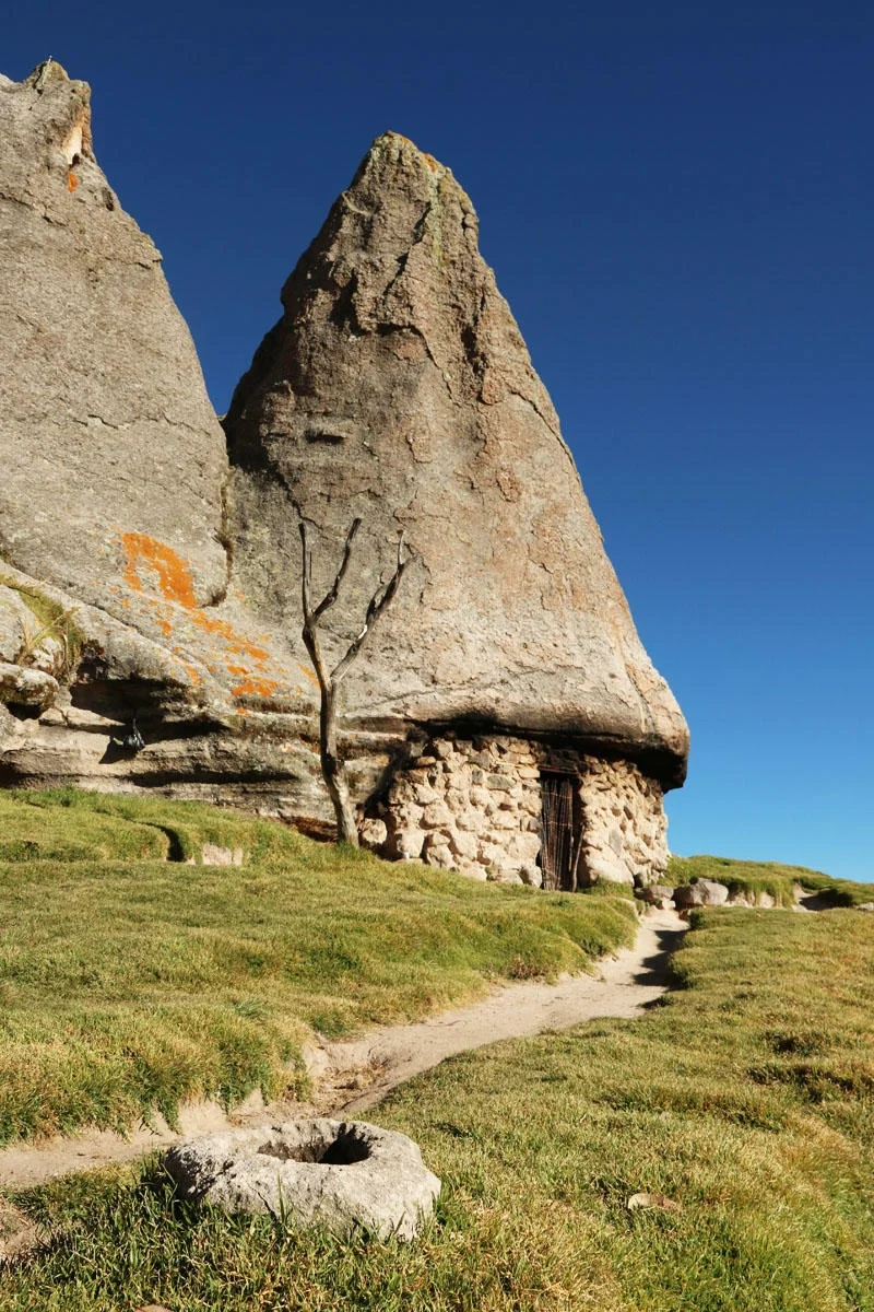 Houses carved in volcanic tuff at Pampachiri, Peru