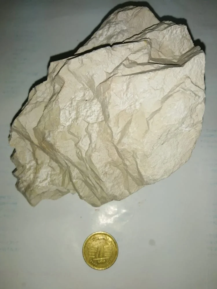 Kaolinite (Al2Si2O5(OH)4)