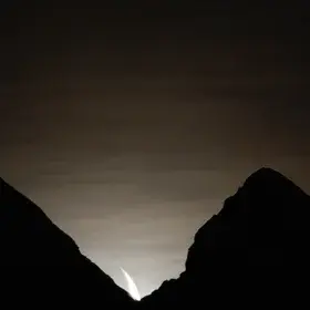 Moonset with earthshine