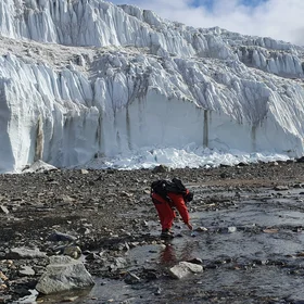 Sampling meltwater of Canada Glacier