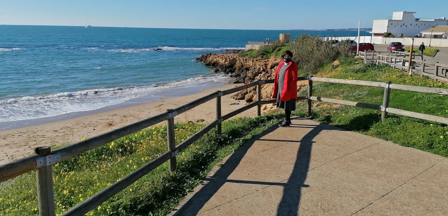 Yaretzi enjoys a cold and windy day at the beach