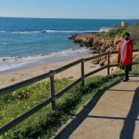 Yaretzi enjoys a cold and windy day at the beach