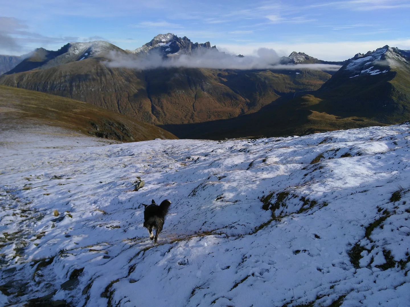 Above the snowline and opposite the clouds