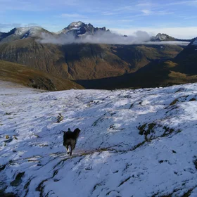 Above the snowline and opposite the clouds