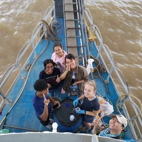 Collaborating to sample plastics in the Mekong River