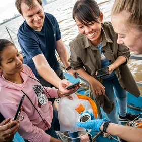 Collaborating to sample plastics in the Mekong River