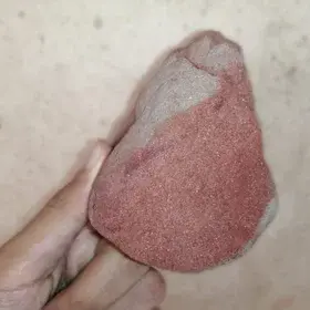 A hand sample of ferruginous sandstone