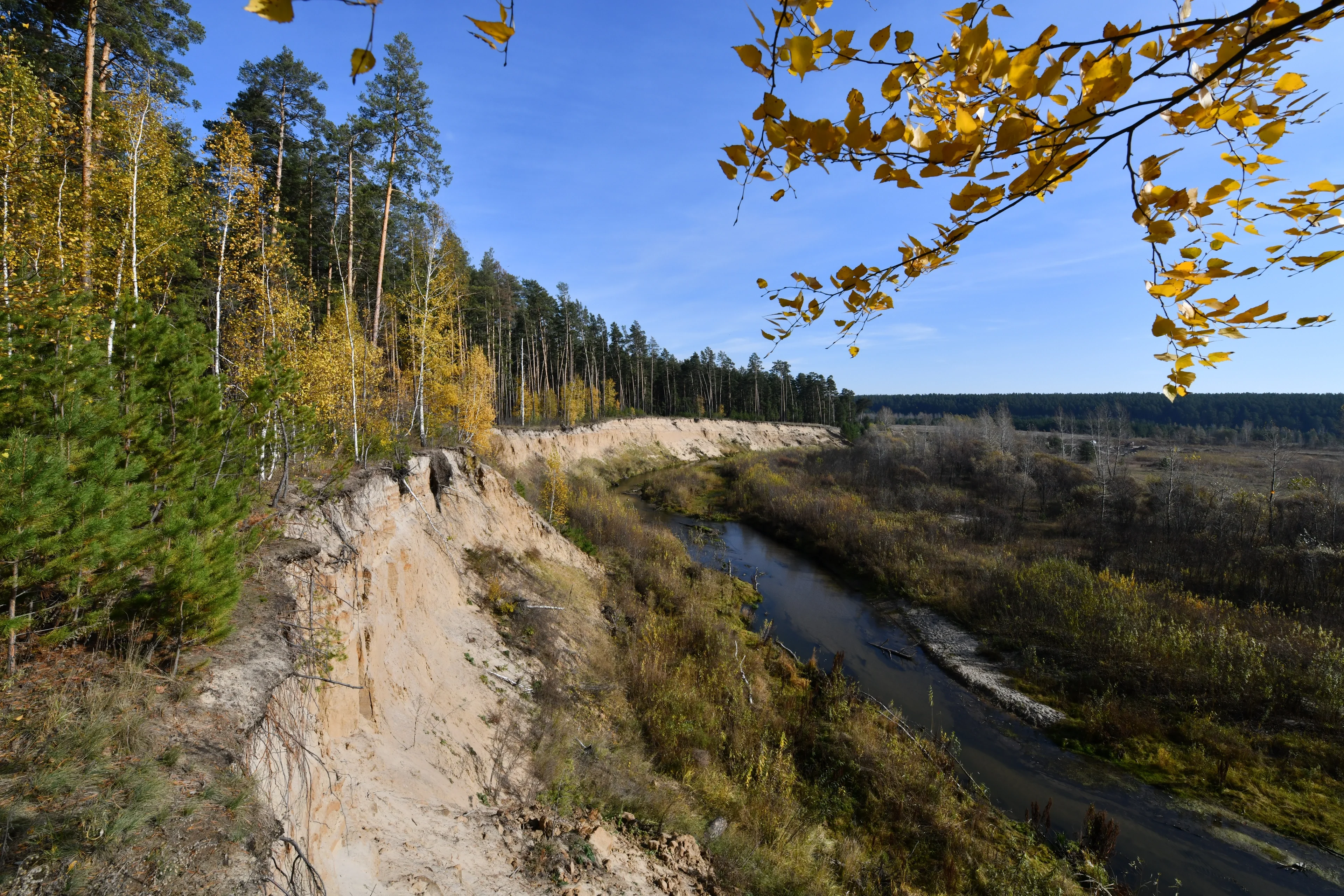 The steep bank of the Kasmala River